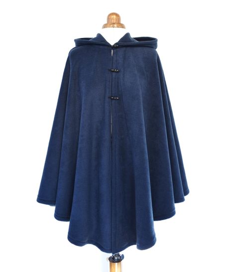 Please note my current order processing time is 5-7 working days. Wrap up in this elegant navy blue handmade hooded cape, made from beautiful soft fleece fabric. Fastened with three toggle buttons, this cape comes in a dark navy colur and is ideal for the spring or autumn weather. Standard size: fits 8 to 16 UK sizes/ 4 to 12 US sizes. Length 78cm / 31 inch Plus size: fits 18 to 24 UK sizes/ 14 to 20 US sizes. Length 86cm / 34 inch * If your height is over 5ft 8in/173cm, please choose 'plus size Mantel Outfit, Wool Cape Coat, Silk Kimono Jacket, Blue Cape, Cape Designs, Poncho Jacket, Kimono Coat, Cape Jacket, Hooded Cape