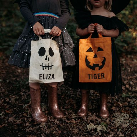 Impress your little monsters with these unique and personalised fabric trick or treat bags. These bags are just the right size for kiddies to store all their special Halloween goodies in and make the perfect addition to any spooky outfit. Your little trick or treaters will love showing these special bags off to all their friends. Choose from a natural bag with a skeleton face design or an orange bag with a pumpkin face design... And don't forget to customise your bag with a name for that special Pumpkin Face Designs, Sac Halloween, Pumpkin Skeleton, Skeleton Face, Special Halloween, Halloween Goodies, Pumpkin Face, Trick Or Treat Bags, Trick Or Treater