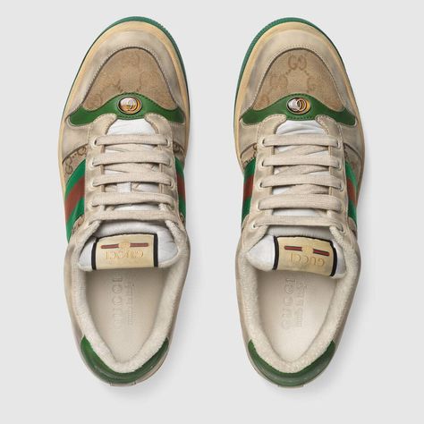 Shop the Men's Screener GG sneaker by Gucci. A pastiche of different influences that span across decades, the Cruise 2019 collection references old school shapes and materials inspired by vintage sportswear. Influenced by classic trainers from the '70s, these sneakers mix leather with Original GG canvas, featuring the Web stripe and Gucci vintage logo, treated for an allover distressed effect. Bottega Veneta Chain Pouch, Tenis Gucci, Gucci Screener, Dapper Dan, Vintage Sportswear, Gucci Sneakers, Mens Slides, Balenciaga Track, Logo Vintage