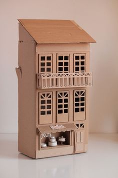 Building Made Out Of Cardboard, Cardboard House Sculpture, Cardboard Builds, Cardboard Bakery, Cardboard Architecture, Cardboard Structures, Cardboard Buildings, Cardboard Building, Cardboard Box Houses