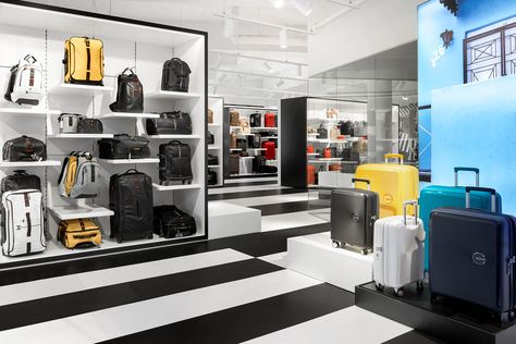 Shop in the fast lane: Samsonite's showroom is made for movement - News - Frameweb Clothes Showroom, Unique Sideboard, Retail Interior Design, Clothing Business, Luggage Shop, Bag Clothes, Boutique Interior Design, Luggage Store, Nyc Design