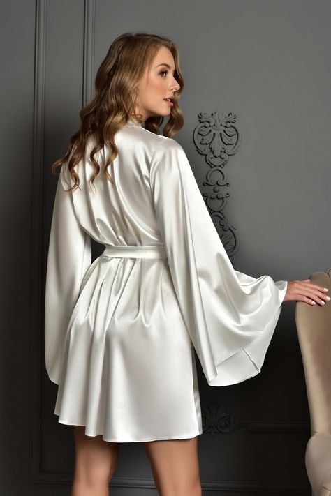 Short satin bridal robe Wedding kimono robe for bride Dressing gown women Ivory bridal party robe Christmas gift for wife https://etsy.me/3QYtnC9 #wedding #ivoryrobe #weddingrobe #robeforbride #ivory #satinrobe #plussize #ivorywedding White Robes, Ivory Bridal Party, Bridal Kimono Robe, Bride Dressing Gown, Satin Bridal Robe, Bridal Kimono, Kimono Dressing Gown, Lace Bridal Robe, Satin Gowns