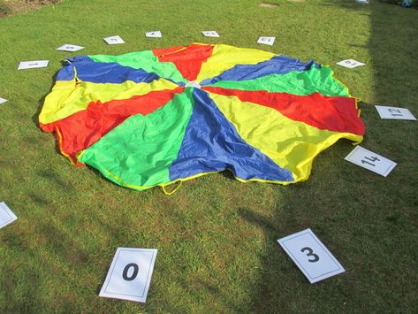 17 Brilliant Parachute Games For PE (For All Ages) – Early Impact Learning Parachute Songs, Parachute Activities, Parachute Games For Kids, Parachute Games, Pe Activities, Pe Ideas, Maths Games, Pe Games, Cooperative Games