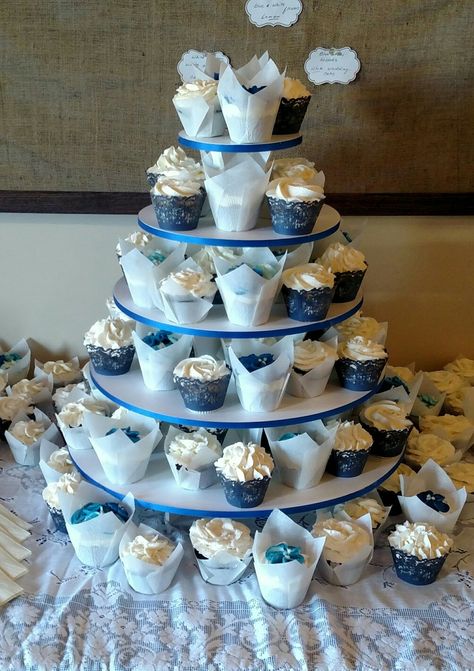 Navy Blue Wedding Cupcakes, Wedding Cake And Cupcake Display, Cake And Cupcake Display, Blue Wedding Cupcakes, Ivory Wedding Decor, Bridal Cupcakes, Wedding Cake Cupcakes, Navy Blue Wedding Cakes, Cheap Wedding Reception