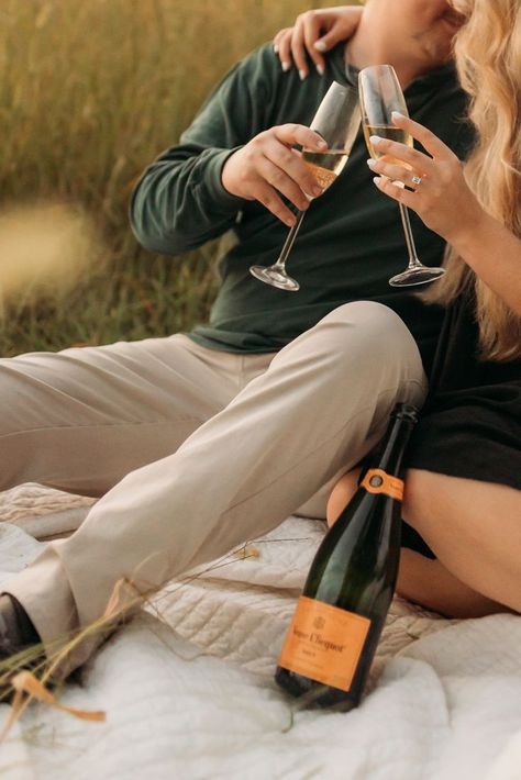 Champagne Golden Engagement Photos Engagment Photo Champagne, Engagement Photo With Champagne, Champagne Glass Engagement Photos, Engagement Pics Champagne, Gold Engagement Photos, Vineyard Couple Pictures, Charcuterie Engagement Photos, Pop Champagne Engagement Pictures, Engagement Pictures With Champagne