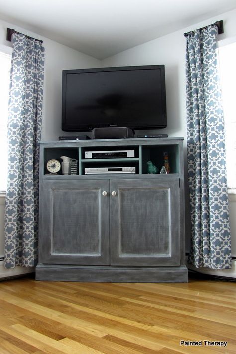 Build your own "Get Out of the Way of the TV" console. With cabinets for toys and books! Move TV to where leather chair is. Tall Corner Tv Stand, Media Console Diy, Build A Tv Stand, Corner Entertainment Center, Corner Tv Console, Tv Stand Plans, High Tv Stand, Tv Corner, Tall Tv Stands