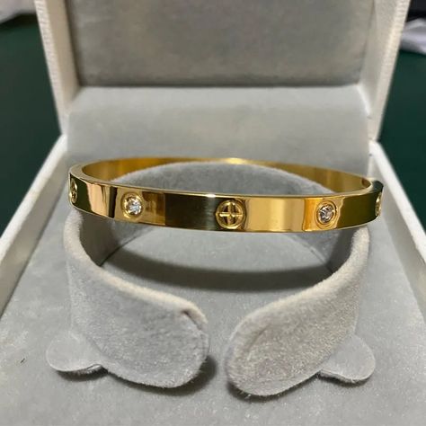 Introducing GoldenHarmony, a new design that marries elegance with edge. This gold-colored bangle and bracelet for women stands out with its unique incorporation of zircon stones and a cross nut nail motif, symbolizing strength and beauty intertwined. Buy Now from our website ! "🎁 Enjoy free shipping on purchases over $100! #LuxuryBracelets #Jewelry #waistedbyfridaysgh #classic #luxuryanklets #boldandbeautiful #happyweekend #springtime #springvibes #waistbeadqueen Screw Bracelet, Bangle Design, Nail Bracelet, Gold Bangles For Women, Leg Chain, Silver Nail, Bracelet Couple, Bracelet Love, Mens Bracelet Silver