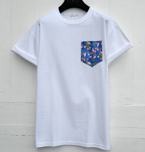 Front Pocket Tshirt Design, Pocket Graphic Tees, Graphic Tee Short Sleeve T-shirt With Pockets, Blue T-shirt With Pockets And Short Sleeves, Pocket Shirts, Pink Cotton T-shirt With Pockets, Pocket Tee Shirts, Shirt Pocket, Flamingo Pattern