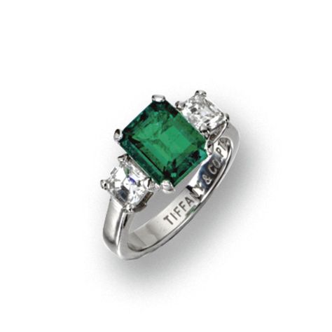 EMERALD AND DIAMOND RING, TIFFANY & CO The emerald-cut emerald weighing 1.91 carats, flanked by 2 square-cut diamonds weighing approximately 1.00 carat, mounted in platinum, size 5¾, signed Tiffany & Co. Tiffany Engagement Ring Emerald, Diamond Ring Tiffany, Tiffany Jewellery, Square Cut Ring, Jewellery Tiffany, Tiffany Diamond Ring, Tiffany Wedding Rings, Tiffany Bracelet, Tiffany Engagement