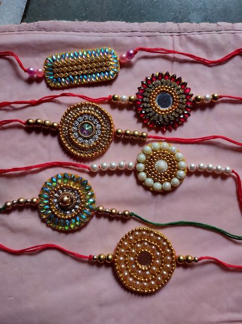 Hand Made Rakhi For School, Handmade Rakhi Designs Ideas Unique, Rakhi From Waste Material, Homemade Rakhi Designs, How To Make Rakhi For School Competition, Rakhi Making For Kids Competition, Simple Rakhi Designs Handmade, Handmade Rakhi Designs Diy, Rakhi Making Ideas Handmade For Competition