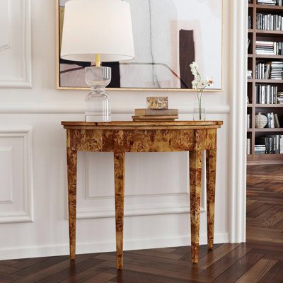 With simple lines, a traditional style, and a demilune shape, this console table will last for generations. The front apron and legs are adorned with simple and lovely hand-carved details. | August Grove Hulse Console Table Brown 30.5 x 36.0 x 14.0 in, Wood | AGRV3880_80862388 | Wayfair Canada Half Moon Table, Demilune Table, Elegant Console Table, Wood Console Table, Entry Table, Table Wood, Wood Console, Formal Living Rooms, Burled Wood