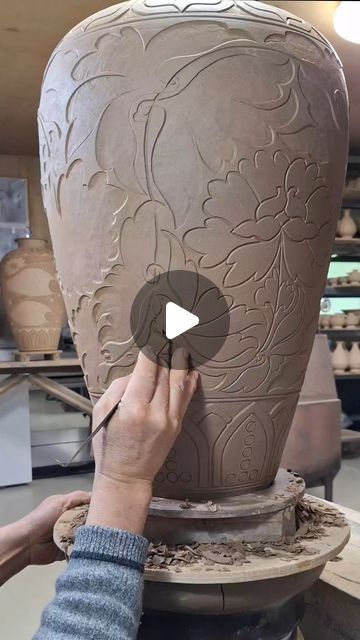 Love in Pottery on Instagram: "by @hwasimdoyo. Carving Lotus flower design on a buncheong jar Technique of pottery craftsmanship passed down from master for six generations. FOLLOW👉 @loveinpottery for more pottery contents ☕️ !  visit their page and support 💕  Follow us on @mustvisitguide (Travel Lovers) & @musthomeguide (Interior Lovers) !  #homedecor #stoneware #artist #art #tableware #ceramicartist #ceramicsculpture #wheelthrown #craft #sculpture #keramik #clay #ceramics #instapottery #ceramica #design #handmadeceramics #glaze #pottersofinstagram #contemporaryceramics" Clay Carving Designs, Ceramic Carving Designs, Carving Ceramics, Ceramic Sculpture Artists, Pottery Carving, Craft Sculpture, Carved Pottery, Handbuilt Pottery, Lotus Flower Design