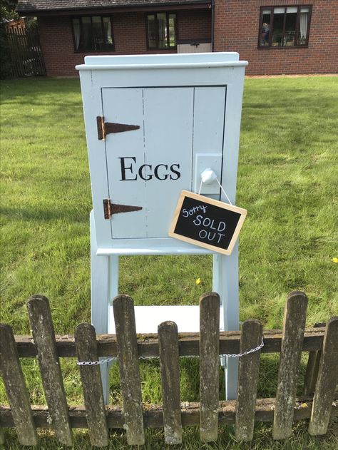 My repurposed egg shed. It was filthy and brown, covered in bird droppings and dust when we brought it. It had spent at least 60 years in a barn. I cleaned and painted it. Now it's at the side of the road, our egg honesty box. First day we sold out in 4 hours!! Honesty Box For Eggs, Road Side Stands, Road Side Egg Stand, Egg Stand Roadside, Roadside Stand, Eggs For Sale, Vegetable Stand, Chicken Coup, Egg Stand