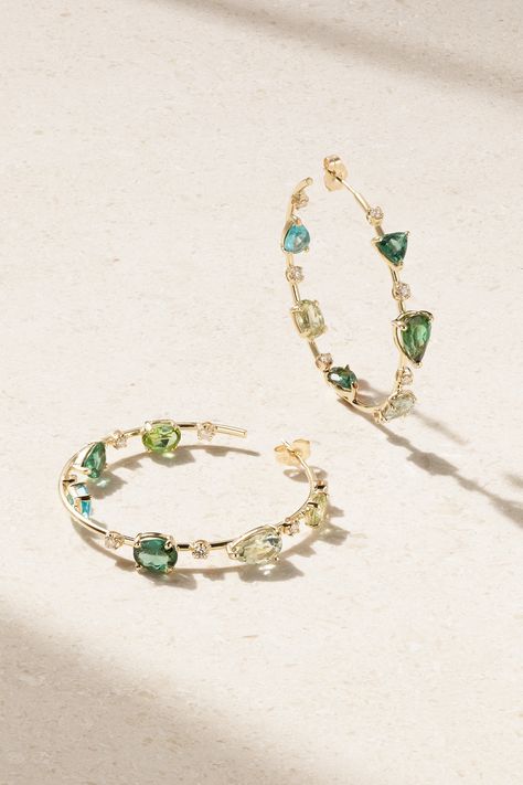 Jacquie Aiche says, "there's something ethereal in the way that jewelry can make women feel… it's like magic." These 'Sophia' hoops are set with a beautiful mismatch of aquamarines, tourmalines and apatite stones in mood-boosting colors. They're handmade from 14-karat gold and dotted with diamonds for added sparkle.