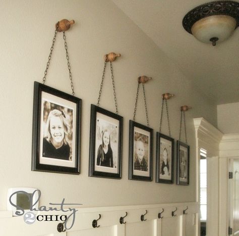 Make your house a home with these stylish ways to display family photos. School Pictures Display, Picture Display Wall, Family Photo Gallery Wall, Hallway Pictures, Family Pictures On Wall, Photo Wall Display, Family Photo Wall, Display Family Photos, Diy Wand