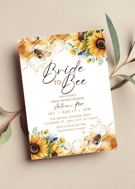 Editable bride to bee bridal shower invitation perfect for your bee themed event. This invitation can be edited yourself using Canva. If you choose to print yourself the print size is 5x7 and can be printed on cardstock invitation paper. You can also have the completed file taken to your local print shop and have them print. Can also be saved as an image to use as a text invitation or email invitation. All the wording is editable. Details: Bride to bee bridal shower Invitation, with gold honeycomb, sunflower and bee design.  HOW IT WORKS: ♥ Once purchased, you will receive a link that will take you to Canva.com where you will be able to edit the template. You will be able to edit wording, font, and font size,  Save your template and download. You can use these downloads to print, email or Bee Themed Bridal Shower Invitations, Met On Bumble Wedding, Bumble Bee Wedding Theme, Bumblebee Bridal Shower Ideas, Sunflower Bridal Shower Theme, Bridal Shower Honey Theme, Bride To Bee Bridal Shower Ideas Decor, Honey Themed Bridal Shower Ideas, Bridal Shower Bee Theme