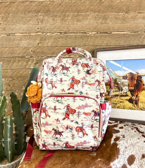 Make It Western - Cowboy Backpack. Two side pockets. Zipper Back. Zipper Closure. Small Front Pocket. App: 17x 14" x 7” Western Baby Nursery, Western Crib, Western Baby Nurseries, Pocket App, Baby Bank, Cute Diaper Bags, Western Nursery, Baby Name Reveal, Stylish School Bags