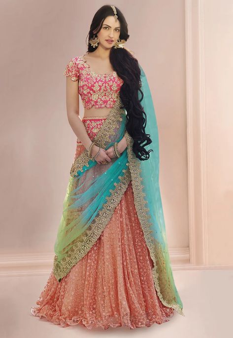 Net Lehenga in Peach Prettified with Zari, Resham, Sequins and Beads Work Available with a Pink Semi-stitched Art Dupion Silk Choli and a Light Blue and Green Net Dupatta The Semi-stitched Lehenga Waist and Hips are Customizable from 30 to 38 and 36 to 46 inches respectively and its Length is 40 inches Do note: Accessories shown in the image are for presentation purposes only.(Slight variation in actual color vs. image is possible.) Orang India, Sari Lehenga, Fancy Lehenga, Blouse Lehenga, Pengantin India, Half Saree Lehenga, Indian Lehenga Choli, Lehnga Dress, Designer Bridal Lehenga