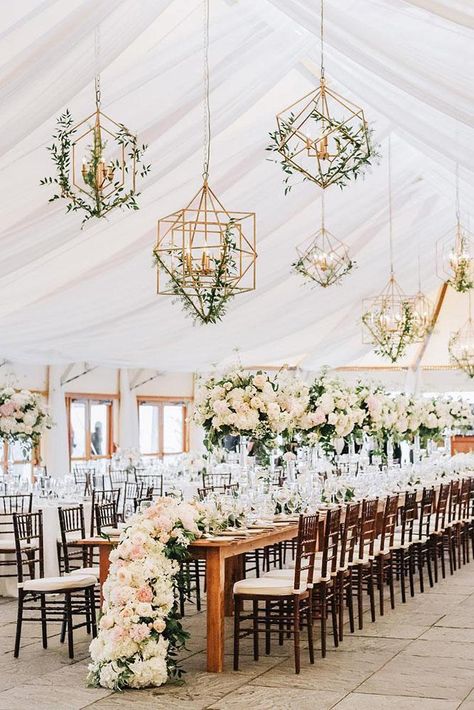 summer wedding trends reception under the tent with tall centerpieces white flower table runner and hanging geometry candles with greenry lenamirisola Floral Chandelier Wedding, Wedding Reception Design, Wedding Chandelier, Elegant Wedding Reception, Tent Decorations, Flower Table, Wedding Floral Centerpieces, Floral Chandelier, Tall Centerpieces