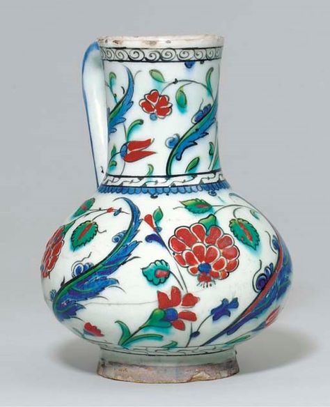 AN IZNIK POTTERY JUG | OTTOMAN TURKEY, CIRCA 1570 | Christie's Modern Art Works, Iznik Pottery, Iznik Tile, Latin American Art, Pottery Jug, Islamic Artwork, Ceramic Vases, Ceramic Dishes, Glazes For Pottery