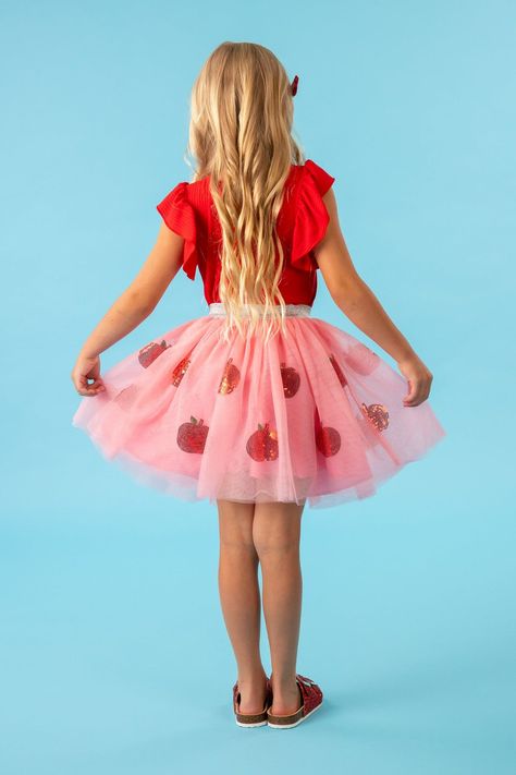 *Please refer to size chart for the best fit* Red short sleeve top features a Pre-K through 4th Grade design Easy pull-on pink tutu skirt with sequin apple details Elastic waistband allows for comfort and ease Perfect for the first day of school Your sassy little one will look so cute at school in this "Pre-K - 4th Grade" Pink Apple Tutu Skirt Set for girls. The red ribbed top features a feminine ruffle sleeve design and looks adorable paired with the matching tutu skirt. The stretchy waistband Poofy Skirt, Long Skirt And Top, Pink Tutu Skirt, Sparkle In Pink, Pink Apple, Pink Tutu, Ribbed Top, Red Shorts, Tutu Skirt