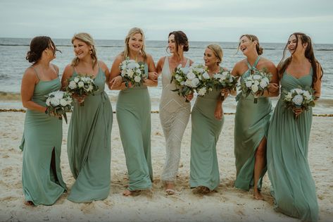 Bridesmaids light green color wedding dresses same color different style walking down the beach having fun time with gorgeous bride at #royaltonrivieramaya Small Beach Wedding Bridesmaid, Green Beach Bridesmaid Dresses, Beach Bridesmaid Dresses Boho, Green Bridesmaid Dresses Beach, Light Green Color Palette, Brides Maid Dresses Blue, Mismatched Green Bridesmaid Dresses, Light Green Bridesmaid Dresses, Beach Wedding Bridesmaid Dresses