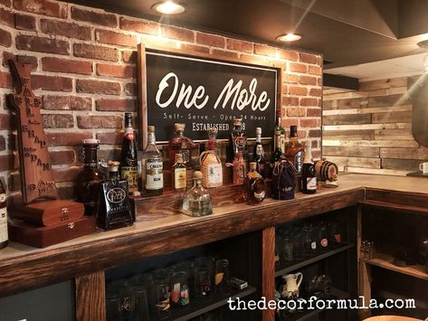 The Details of Our Basement Remodel — The Decor Formula Basement Bar Sign Ideas, Bar Remodel Ideas Basement, Diy Speakeasy Basement, Basement Wall Ideas Decor, Pub Wall Design, 60s Basement Remodel, Basement Bar Wall Decor, Basement Bar Decor Ideas, Basement Bar Wall Ideas