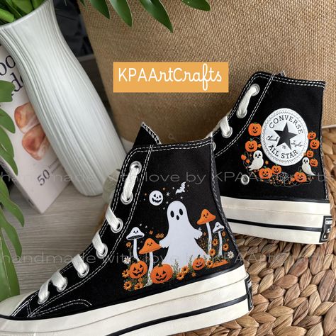 Mushroom Ghost Hand Embroidery Converse, Spooky Boo Embroidered  Hi Top Shoes, Custom Halloween Cute Ghost Face With Mushrooms and Pumpkins The Mushroom Ghost Hand Embroidery Converse are custom high-top sneakers that feature a whimsical design perfect for Halloween. Each pair showcases a cute ghost face adorned with mushrooms and pumpkins, all intricately hand-embroidered to create a unique and playful aesthetic. These spooky yet charming sneakers are ideal for those looking to express their lo Shoe Design Ideas Diy, Converse Designs Ideas, Custom Shoes Ideas, Unique Shoes Women, Hand Painted Shoes Ideas, Halloween Converse, Cute Ghost Face, Mushroom Ghost, Embroidery Converse