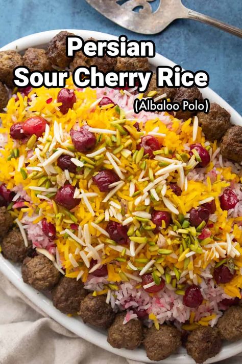 Looking to impress your guests? This dish is the way to go. This classic Persian dish is such a showstopper with its one of a kind flavor and bright colors. Albaloo polo is a traditional Persian rice dish with sweet and sour flavors. The vibrant color and bright flavors of this dish come from the sour cherries mixed with rice and topped with saffron rice, pistachios and almonds. Cherry Rice, Persian Food Iranian Cuisine, Persian Rice, Iranian Recipes, Iranian Cuisine, Sour Cherries, Saffron Rice, Rice Side Dishes, Rice Dish