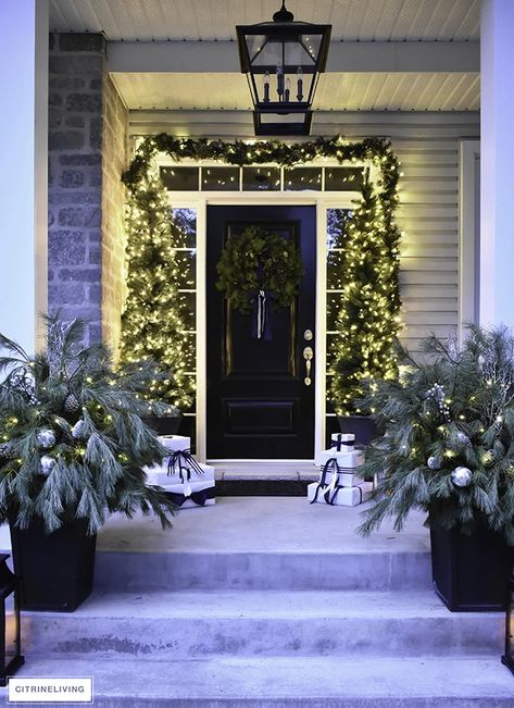 Christmas Front Porch Decor with Fresh Greenery - CitrineLiving Outdoor White Lights Christmas, Outdoor Christmas Decorations Modern, Modern Front Door Christmas Decor, Modern Christmas Decor Outdoor, Pottery Barn Christmas 2023, Modern Outdoor Christmas Decor, Porch Christmas Lights, Pottery Barn Christmas, Front Door Christmas Decorations