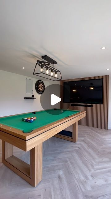 Emily 🤍 on Instagram: "POV you create the perfect space for the summer… 
Introducing the garden room ☀️ 

The perfect area for entertaining family and friends complete with a pool table, dart board and bar (my boyfriends choice), but seeing as he built it from scratch I didn’t really have a say🤭. 

Details:
Cabinets and worktops- @howdensjoinery 
Panelling- @volgapanels 
Sofa - @sofaclub.uk 
Bar stools - @dunelmuk 
Lights - @ikeauk 
Pool table - @libertygamesuk 
Flooring - @directwoodflooring 

#gardenroom #gardenrooms #gardenroomsproject #gardenroomdesign #beforeandafter #transformation #rennovation #homerenovation #beforeandafterhomeedition #panelling #bar #homebar #barideas #barstools #herringbone #herringbonefloor #gamesroom" The Garden Room, Herringbone Floor, Dart Board, Family Entertainment, Pool Table, Garden Room, Bars For Home, Home Renovation, Bar Stools