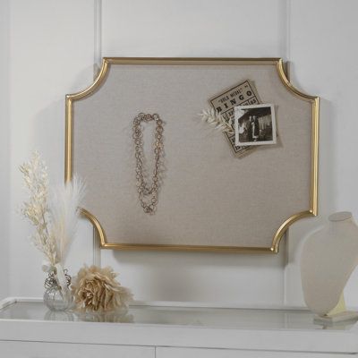 This decorative pin board features a scalloped gold painted rectangle metal frame. The cork board is covered by cream colored linen with an MDF backing. It is the perfect combination of beauty and function. Use this bulletin board to organize your space. Perfect to pin paperwork, photos, mementos, artwork, invitations, reminders and more. This pin board with a decorative twist and neutral coloring is perfect to display in your kitchen, office, bedroom, and any other space which can use some orga Fabric Covered Pin Board, Jewelry Cork Board, Pinboard Ideas Aesthetic, Cork Board Decor, Corkboard Decor, Office Cork Board, Pinboard Ideas, 2024 Lookbook, Kitchen 2024