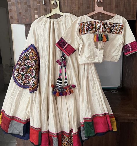 Unique Navratri Outfits 2024, Unique Navratri Outfits, Navratri Fits, Garba Outfit, Chaniya Choli Designs, Long Blouse Designs, Navratri Collection, Mirror Work Blouse Design, Cotton Blouse Design