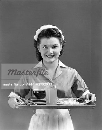 1940s SMILING WAITRESS WEARING A CAP & UNIFORM WITH WHITE COLLAR & APRON HOLDING A SERVING TRAY – Image © ClassicStock / Masterfile.com: Creative Stock Photos, Vectors and Illustrations for Web, Mobile and Print Retro Waitress, Waitress Hairstyles, Waitress Outfit, 1940 Style, 1940s Hairstyles, Female Chef, Women's Uniforms, Retro Recipes, Fashion Mood Board