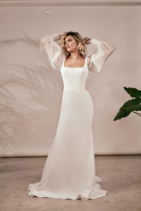 Featuring ‘must have’ statement sleeves in a beautiful silk organza, this form fitting gown creates a stunning impact. Aura has a modern ‘of the moment’ square neckline making it perfect for today’s bride. Build your look with an overskirt or veil. Square Neck Wedding Dress, Grandma Dress, Minimal Wedding Dress, Modern Gown, Popular Wedding Dresses, Simple Gowns, Fancy Wedding Dresses, Dress Making Patterns, Stunning Wedding Dresses