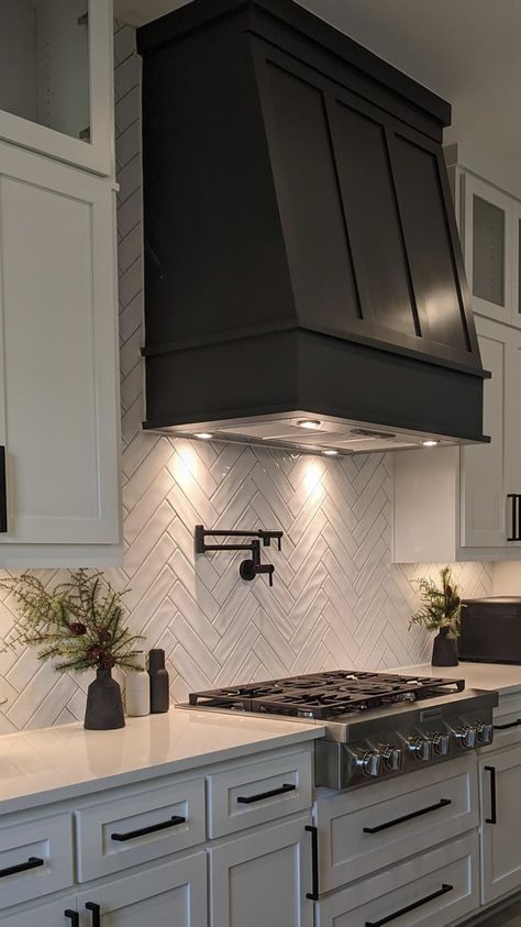 Black In Kitchen, White Kitchen Black Range Hood, Kitchen Ambient Lighting Ideas, Black Hoods In Kitchens, Kitchen French Modern, Kitchen Hood Backsplash Ideas, Dinning Chandeliers Ideas, Kitchen Hallway Ideas, Gray Kitchen Cabinets Black Hardware