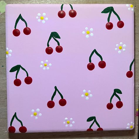 4x4 ceramic hand painted cherry coaster. Sealed with a glossy water resistant finish and a layer of cork on the bottom to prevent sliding and movement on flat surfaces. Painting As A Hobby, Easy Painting Patterns Simple, Hand Painted Strawberries, Pretty Flower Paintings Easy, 4 Mini Canvas Painting Ideas, Cute Cherry Painting, 10x10 Painting Ideas, Mini Paintings Simple Easy, Easy Cute Acrylic Paintings