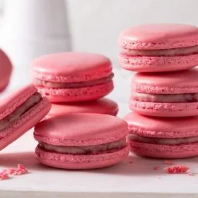 Raspberry and White Chocolate Macaron Recipe | Chelsea Sugar Chocolate Macaron Recipe, Raspberry Macarons, Raspberry And White Chocolate, Macarons Recipe, Chocolate Macaroons, Chocolate Macaron, Strawberry Dessert Recipes, Recipes Cookies, Buttercream Filling