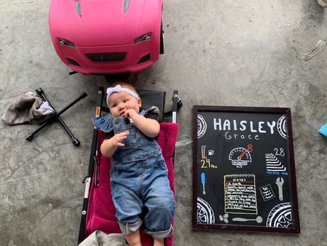 Milestone photo with mechanic theme Gender Reveal Ideas For Car Guys, Mechanic Gender Reveal Ideas, Car Themed Baby Announcement, Mechanic Baby Announcement, Mechanic Themed Nursery, Mechanic Nursery Theme, Baby Mechanic, Racing Baby, Baby Milestones Pictures