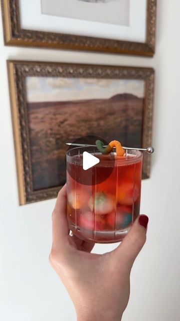 lex nicoleta on Instagram: "SOUR GUMMY WORM COCKTAIL RECIPE ⬇️

INGREDIENTS:
-3/4 oz voddy 
-1/2 oz chambord
-1/2 oz peach schnapps
-1/2 oz grenadine
-top with ginger ale
-sour gummy worms for garnish + ice cubes
-ENJOY!

#sourgummyworms #candy #recipereels #drinkideas #sweetdrink" Gummy Worm Cocktail, Lex Nicoleta, Sour Gummy Worms, Gummy Worm, Gummy Worms, Peach Schnapps, Sweet Drinks, Recipe Ingredients, Ginger Ale