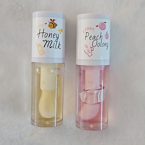 2 Brand New Clear Lip Gloss With Wand Applicators. Peach Oolong And Honey Milk Flavors. Boxes Included. Bubble Tea Lip Gloss, Makeup Products Lip Gloss, Honey Milk Lip Oil, Cute Lip Gloss Ideas, Cute Lip Gloss Aesthetic, Cute Lip Products, Cute Lip Makeup, Milk Flavors, Korean Lip Gloss