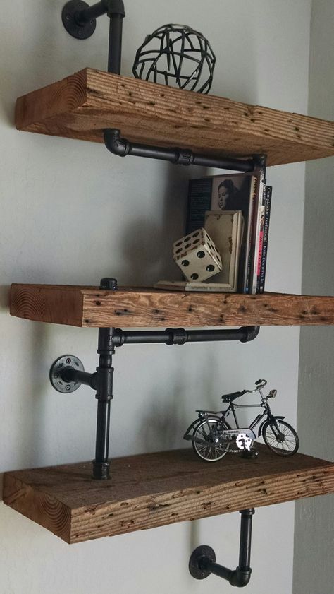 Black Pipe Industrial old wood shelves Staggered Industrial Pipe Shelves, Floating Industrial Shelves, Wooden Pipe Shelves, Black And Wood Industrial Bedroom, Black Pipe And Wood Shelves, Industrial Wooden Shelves, Rustic Industrial Shelves, I Dustrial Shelf, Pipe And Wood Shelves Bathroom