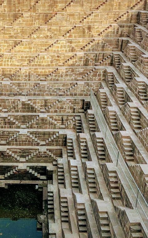 Chand Baori, a stepwell built sometime in the 8th Century in Rajasthan Stepwell Architecture, Chand Baori, Temple Stairs, Step Wells India, Modern Rajasthani Architecture, India Temple Architecture, Rajasthani Building, Temples Of India Architecture, Temple India