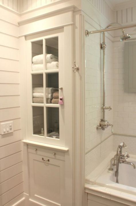 Smart bathroom storage makes use of a narrow space with great molding and a glass-front door.  Plus the exposed thermostatic shower... Rustic Farmhouse Bathroom Ideas, Makeover Kamar Mandi, Small Bathroom Remodel Designs, Rustic Farmhouse Bathroom, Farmhouse Bathroom Remodel, Bathroom Linen Cabinet, Bad Inspiration, Linen Cabinet, Bathroom Remodel Designs