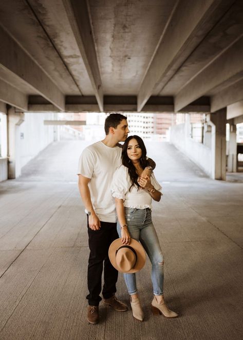 Converse Engagement Photos, Casual Rooftop Engagement Photos, Modern Casual Engagement Photos, Family Photos Parking Garage, Couple Poses Downtown, Top Of Parking Garage Photoshoot Couple, City Engagement Photos Casual, Engagement Photos Outfits Downtown, Engagement Photos Poses Downtown