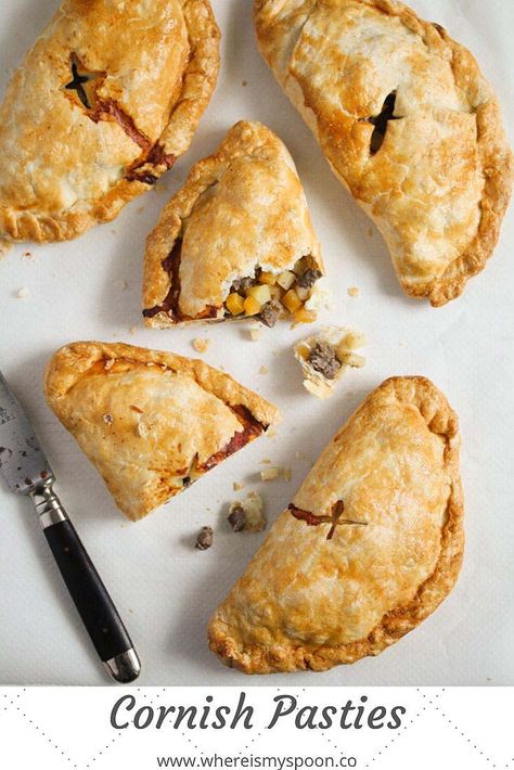 British Cornish pasties – traditional recipe made with beef, rutabaga and potatoes. Who can resist these flaky, golden pastry pockets and that savory filling? #whereismyspoon #cornishpasties #pastyrecipe #britishpasties #britishfood #beefpasties #meatpasties Traditional Cornish Pasty Recipe, Cornish Pasty Recipe, Chicken And Ham Pie, Beef Pasties, Chicken Pot Pie Dinner, Pasty Recipe, Pie Pockets, Pumpkin Pasties, Cornish Pasty