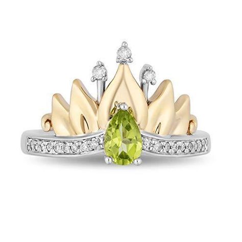 A touch of whimsy to your sense of fashion won't hurt. Go ahead and get yourself this brilliant ring inspired by Princess Tiana. Yes, the Princess, minus the frog. This Enchanted Disney Fine Jewelry Ring features a crown-like band with pave diamonds and 10k yellow gold lotus accent. A peridot that is said to bring good health and good cheer is included for color and an extra dose of playfulness. Princesa Tiana, Disney Princess Tiana, Enchanted Disney, Enchanted Disney Fine Jewelry, Disney Fine Jewelry, Tiara Ring, Gold Lotus, Princess Tiana, Bridal Jewelry Collection