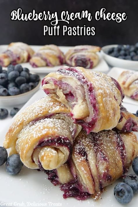 This flaky, sweet and delicious, blueberry cream cheese puff pastry dessert combines the sweet taste of fresh blueberries with a cream cheese mixture and is baked until golden and flaky, and dusted with powdered sugar. As I mentioned in a previous pastry post – in a lot of them, probably – I love making pastries....Read More Mulberry Puff Pastry, Almond Puff Pastry Danish, Blueberry Cream Cheese Pastry, Blackberry Cream Cheese Puff Pastry, Blueberry Crossiant, Blitz Puff Pastry Recipe, Puff Pastry Almond Paste Recipes, Cream And Berry Filled Pastry Balls, Blueberry Puff Pastry Recipes