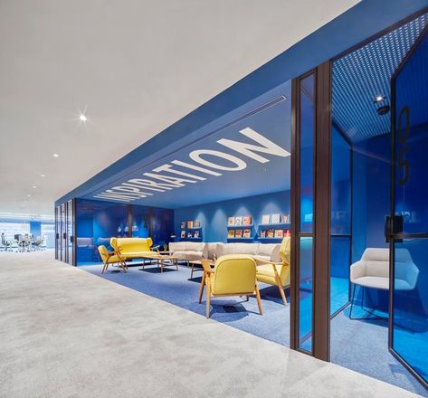 Caixabank Offices | Miriam Barrio Blue Yellow Office, Blue Office Interior, Bold Office Design, Vibrant Office Design, Way Finding, Modern Office Interiors, Corporate Office Design, Blue Office, School Interior