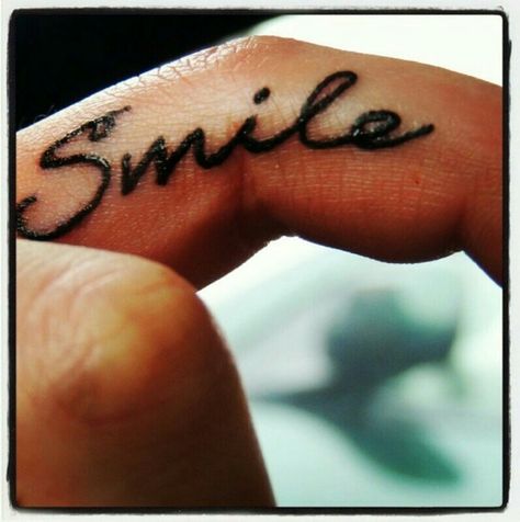 <3 smile tattoo small on finger #Tattoo#Smile#Small#Finger Smile Tattoo On Finger, Smile Finger Tattoo, Smile Tattoo Finger, On Finger Tattoo, Tattoo On Finger, Tattoo Finger, Smile Tattoo, Simple Tattoos For Guys, Small Finger Tattoos